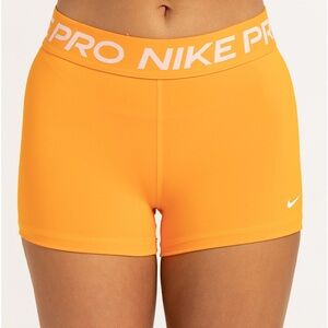 orange nike pros